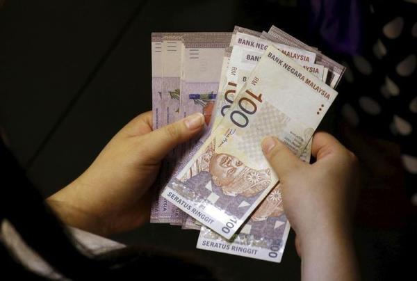 Ringgit opens lower as investors await more Fed signals at Jackson Hole
