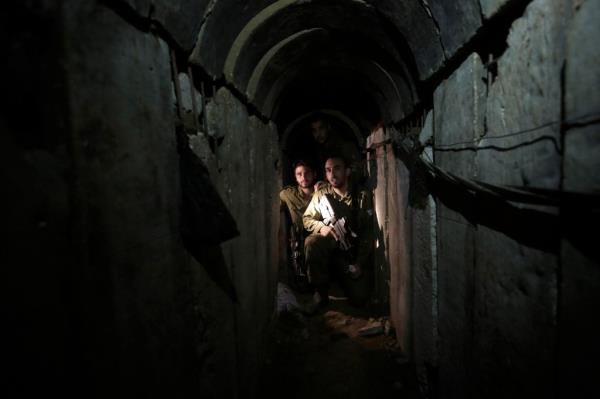 An Israeli officer touring the site of a captured tunnel system in 2014.